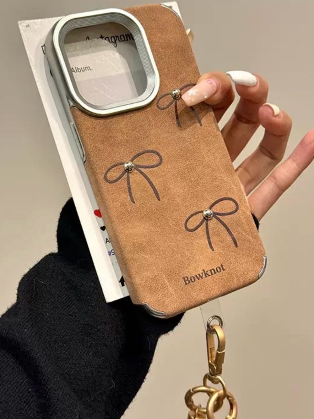 Brown Bowknot Speckle Soft Phone Case with Chain for iPhone 17 Pro Max